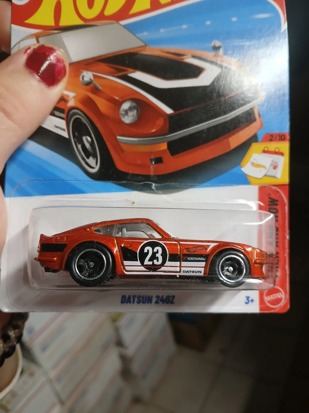 Hot Wheels Mainline 'Then and Now' series Datsun 240Z in metalflake burnt orange